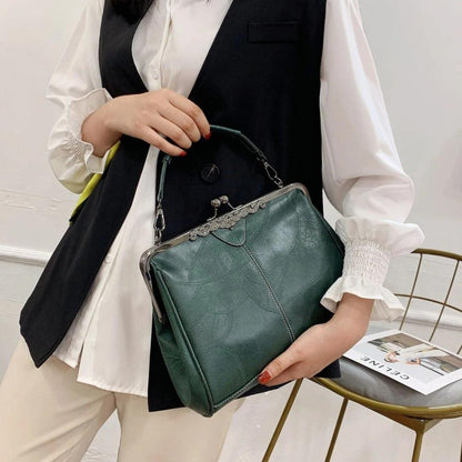 Vintage handtas met kusslot